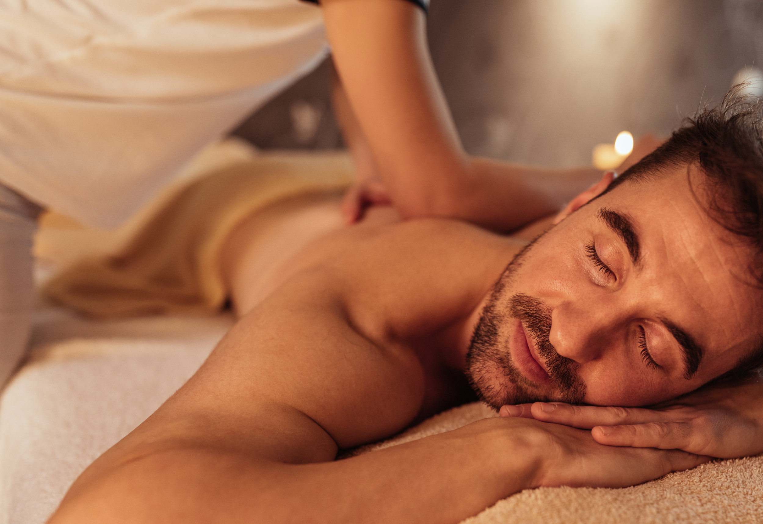 southwind-health-collective-man-receiving-massage-Lawrence-KS